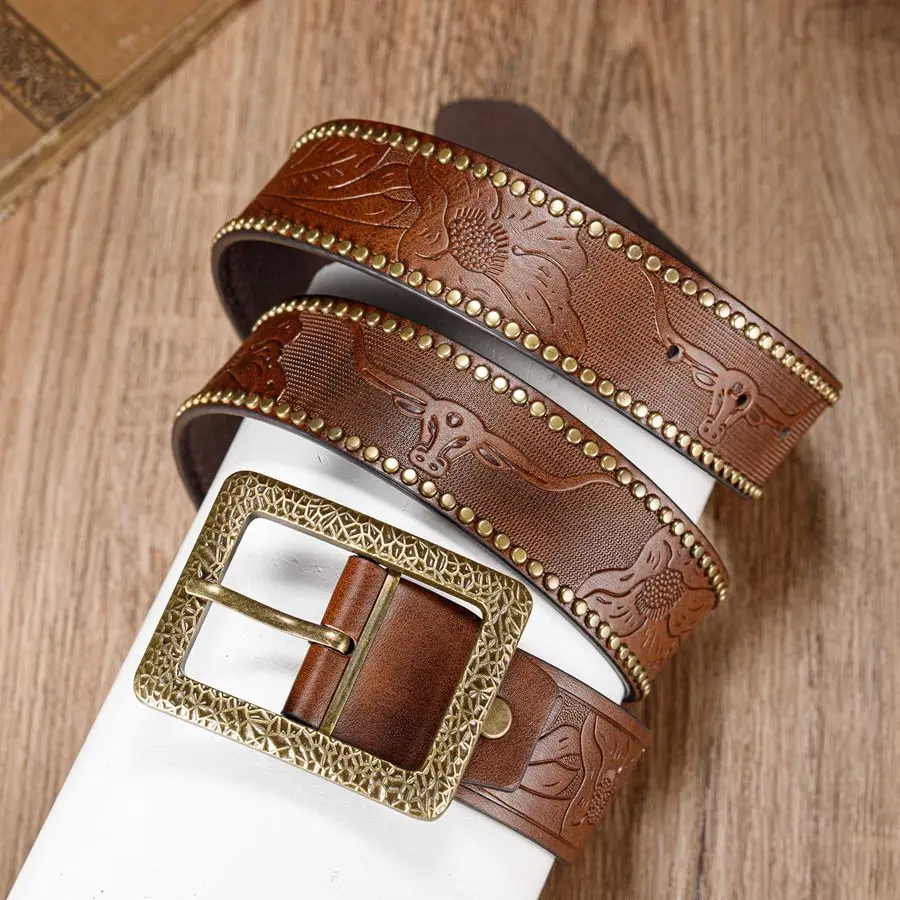 The patterned needle buckle, fashionable bull head embossed rivet belt, trendy and versatile decorative belt suitable for both m