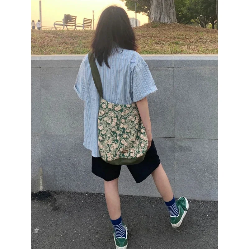 بلوزة نسائية صيفية فضفاضة مخططة بأكمام قصيرة موديل 2024 بجيب Y2k بلوزات جمالية تناسب كل مباراة قميص هاراجوكو ياباني غير رسمي على الموضة