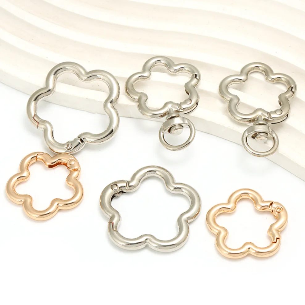 

Zinc Alloy Rotating Plum Blossom Spring Coil Rabbit Head Spring Buckle Bag Keychain Bag Multifunctional Accessories