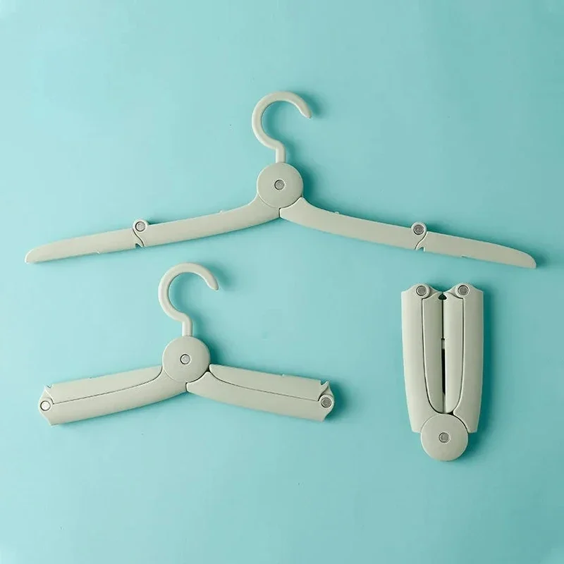 

1PCS Portable Folding Hangers Non Slip Plastic Hanger for Clothes Travel Home Telescopic Clothes Drying Rack Save Wardrobe Space