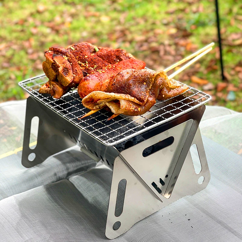 Stainless Steel Barbecue Grill Portable Outdoor Camping Stove Folding Card Stove BBQ Grill Rack Firewood Stove Firepfoof Cloth