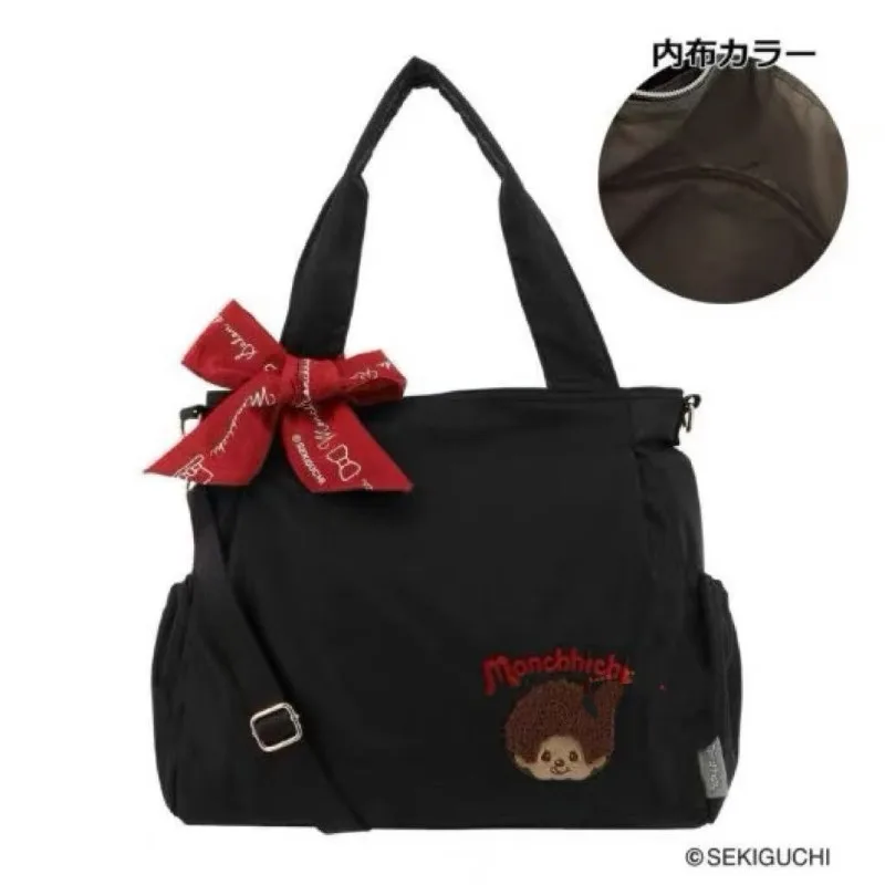 Bolso de hombro de tela Oxford bordada con motivos de Monchhichi, de gran capacidad, ideal como bolso de mano para viajes y que se puede sujetar a una maleta.