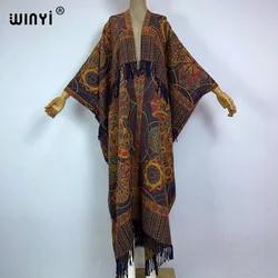 WINYI Winter print cloak Women High Quality poncho tassels Luxury Long Loose OverCoat Thick Warm Female long down coat jacket