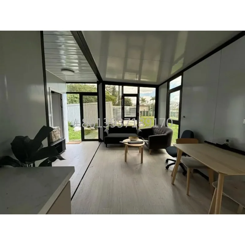Generic Modern Glass Container House, Gray Metal Frame, 12x8x8 Ft, UV-Resistant Sliding Panels, Modular Storage Building