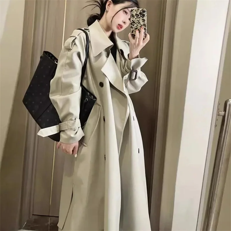 Trench lungo da donna Cappotti con bottoni con lacci Manica intera Colletto rovesciato Giacche con giunture Tasche solide Office Lady Streetwear