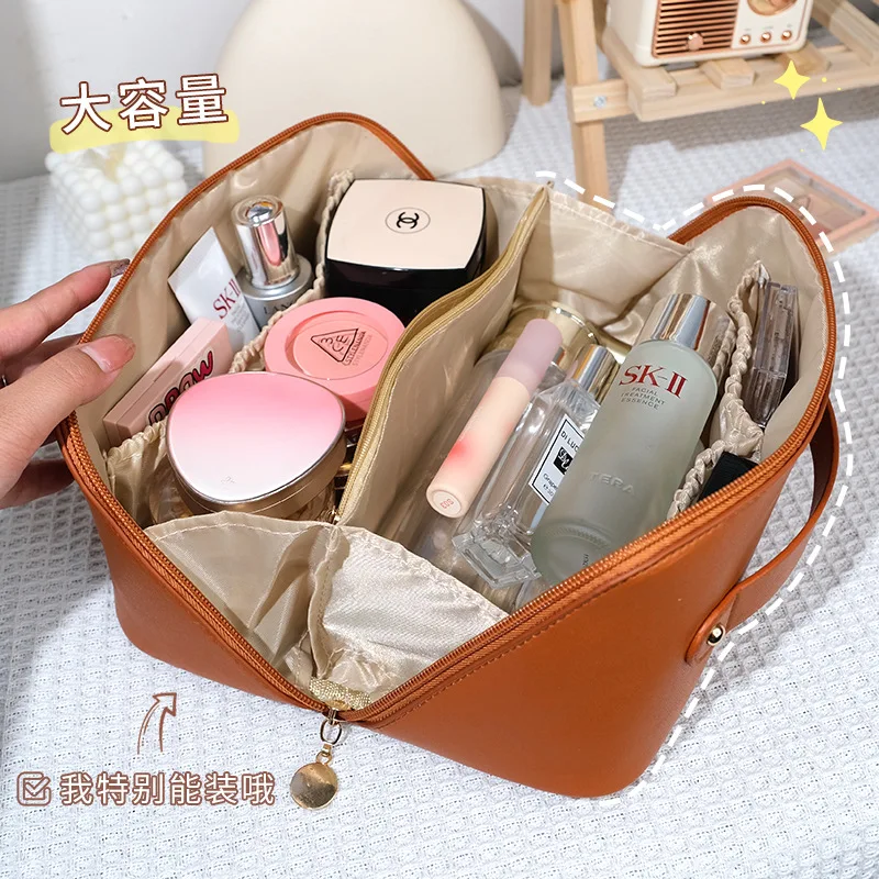 

Cosmetic bag women's large capacity portable ins high sense Internet celebrity super hot travel products Wash and storage bag