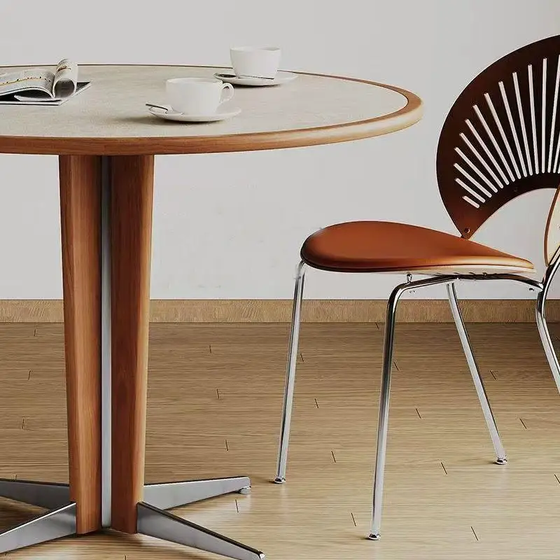 *Mid-century Coffee Table, Sintered Stone Surface, Four-prong Metal Base, Retro-modern fusion for Timeless Interiors.