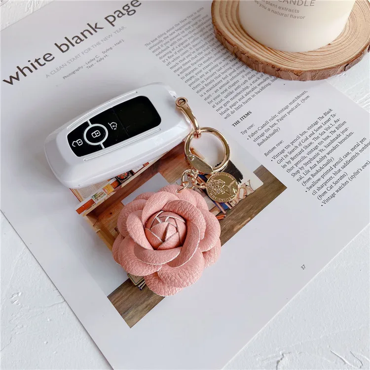 Fashion leather camellia car keychain cute flower backpack pendant accessories personality keychain ring women