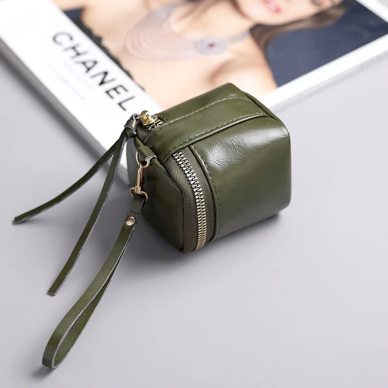 Mini bolso de mano para lápiz labial, novedad de 2025, bolso tipo cubo para auriculares Ins Wind, monedero de almacenamiento de monedas de cuero suave Real