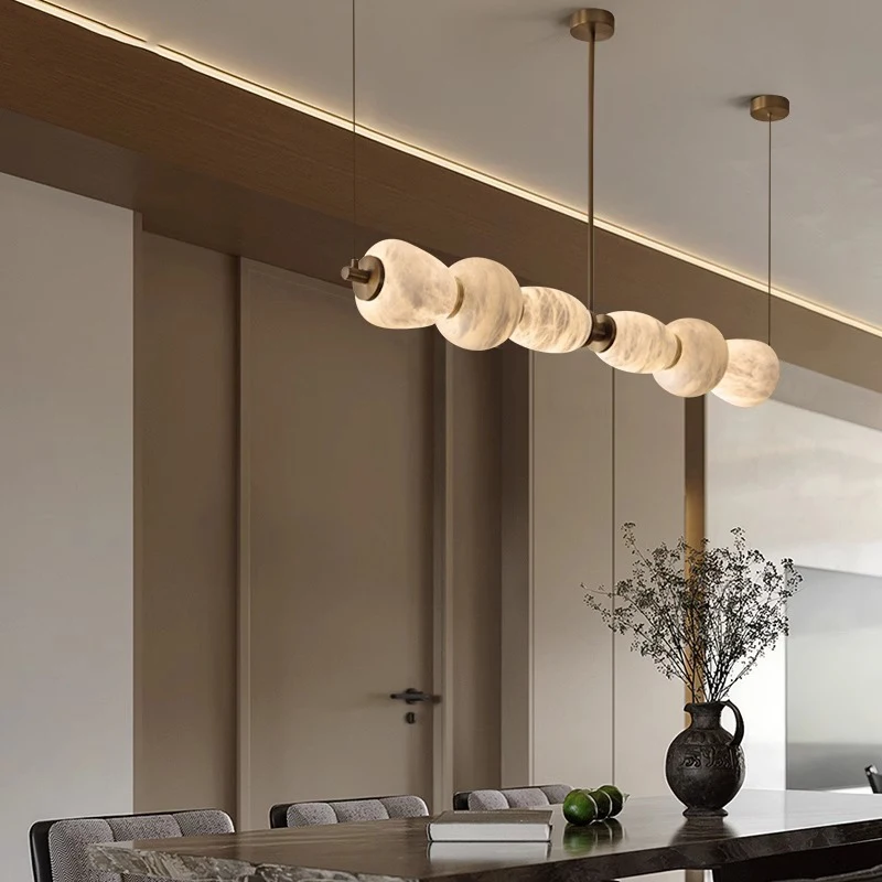 

Italian Minimalis light luxury designer one-word long marble LED chandelier restaurant island bar room study creative lamp