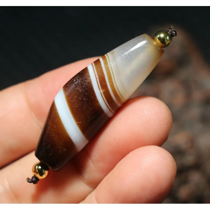 

Energy Tibetan Old Agate Natural Silkworm Stripe Ox Horn Shape dZi Bead Amulet