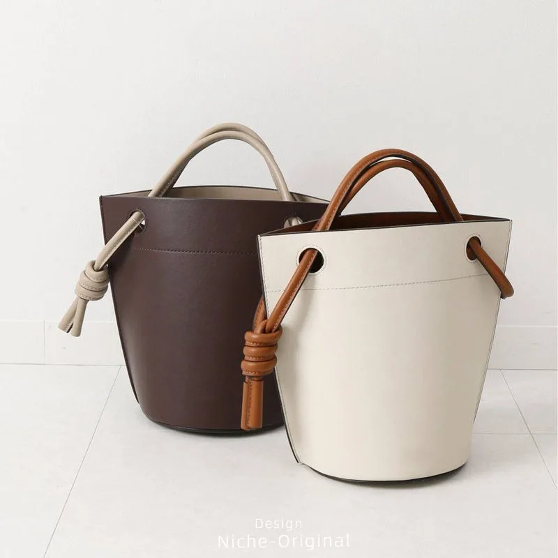 Ms. New Style Individuality Knot Large Capacity Simple Sense of Advanced Underarm Bag Bucket Bag Color Contrast Handbag