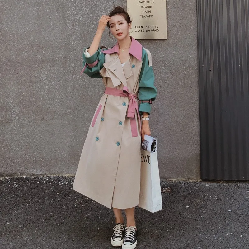 

A new loose and elegant knee-length Herben-style coat for women in contrasting colors