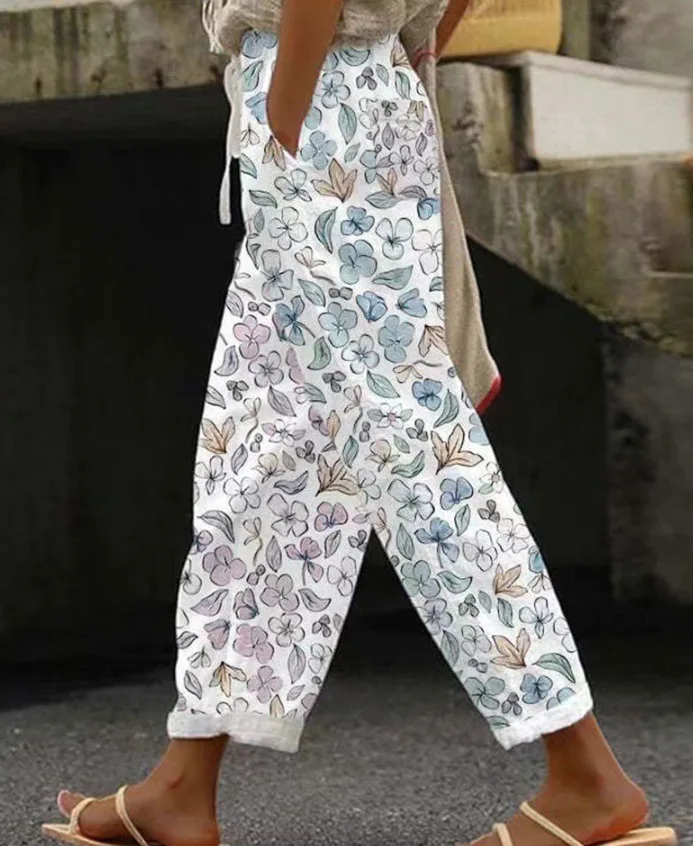 

2025 Women's Summer New Fashionable Casual Printed Trousers Belt Independent Drawstring Pocket Women's Beach Vacation Trousers
