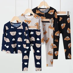 The new 2-piece autumn children's cute flaming thermal underwear suit boy leisure and comfortable home cover girl Joker pajamas