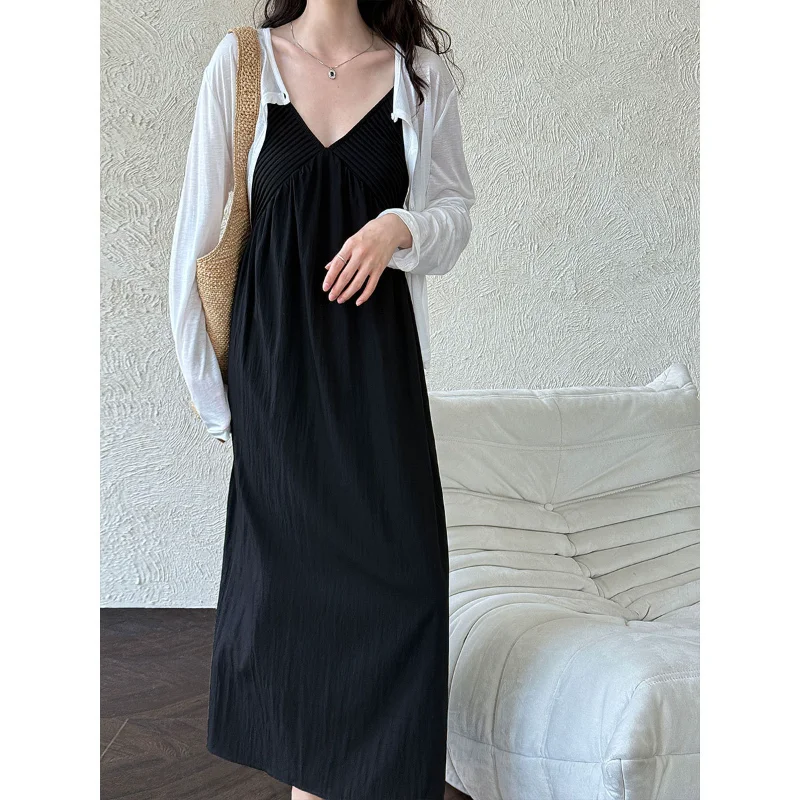Abito da donna stile vacanza al mare con scollo a V francese Abito da donna senza maniche semplice ed elegante nero bianco sexy per festa di nozze