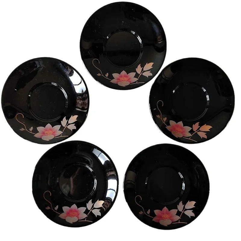 

Natural lacquer set with floral patterns including tea set and plates