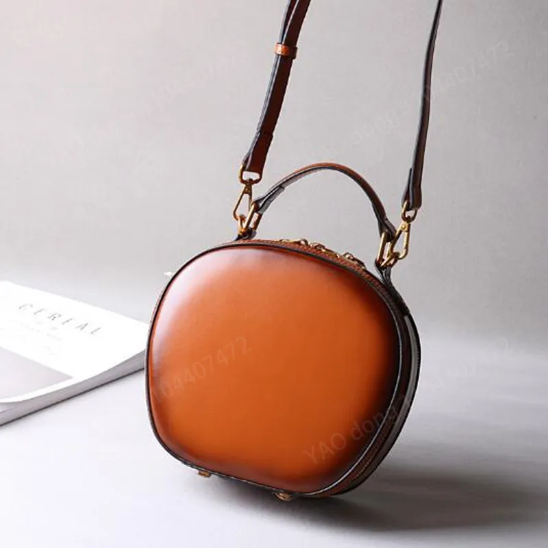 Yao dong bolsa de couro 2024 novo couro feminino retro maçã saco ombro único crossbody portátil moda pequenos sacos redondos