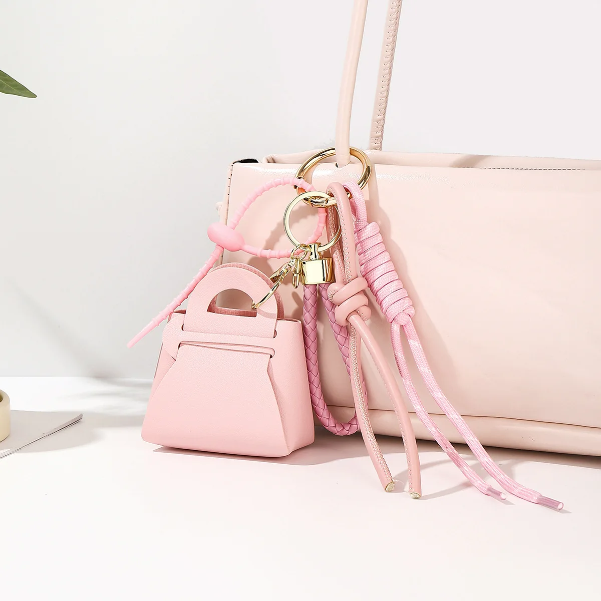 

Popular MIU leather bag modeling pendant mobile phone luggage car key pendant woven rope jewelry
