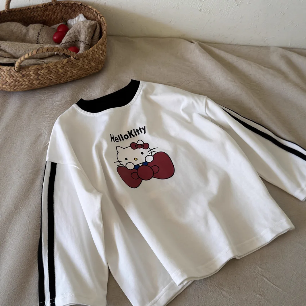 أنيمي HelloKitty الفتيات النسخة الكورية الخريف تي شيرت القوس القط مطبوعة بأكمام طويلة تي شيرت الأطفال ثلاثة بار فضفاض رداء علوي غير رسمي