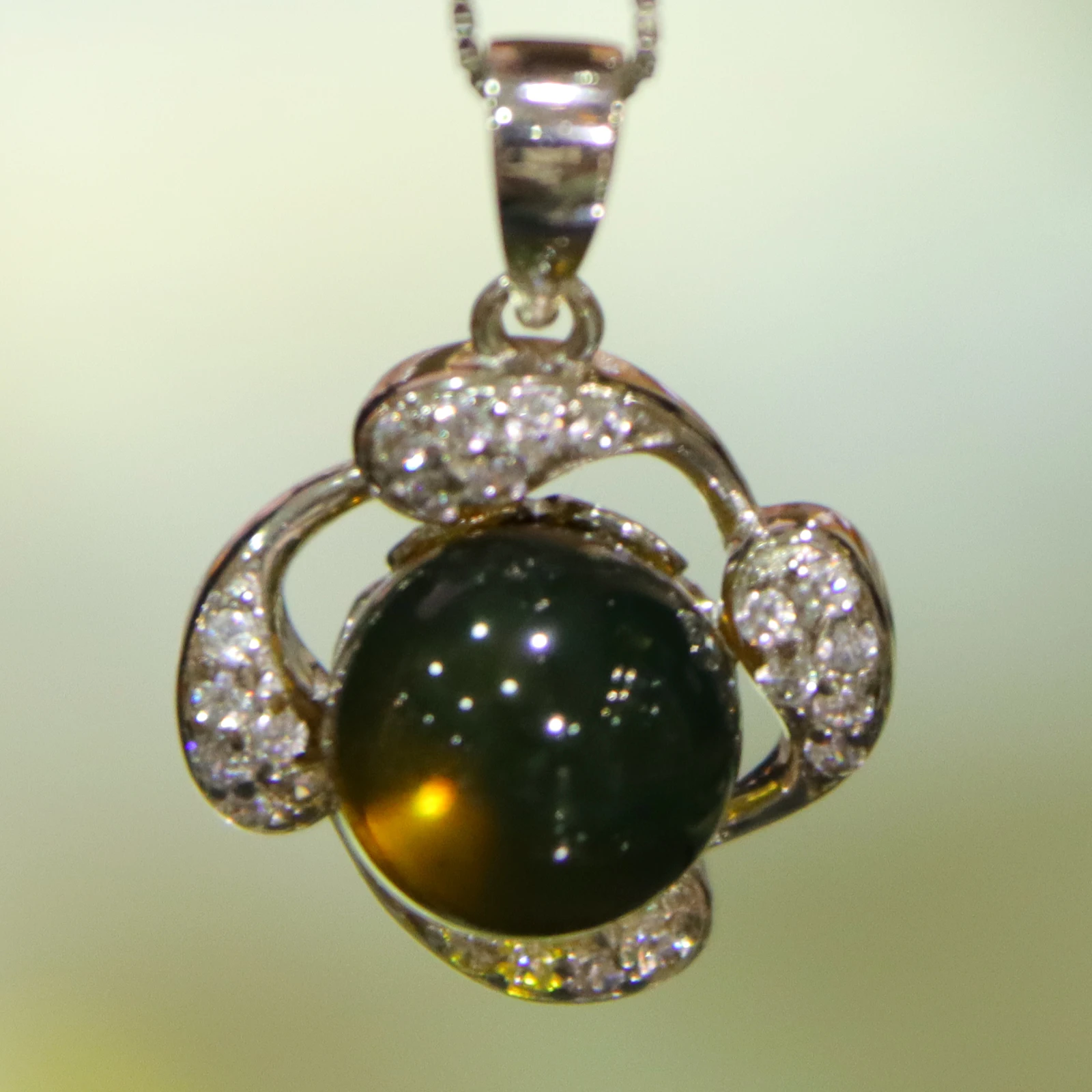 

Pure Sterling Silver with Natural Mexican Blue Amber Flower Shaped Pendant 9mm Amber Bead Includes a Sterling Silver Necklace