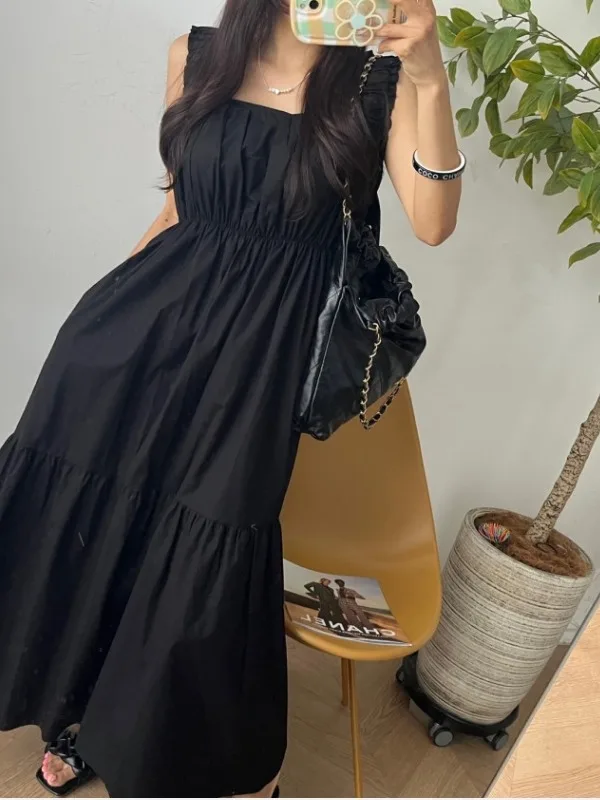 فستان منقوش باللونين الأبيض والأسود بدون حمالات للنساء بخصر فضفاض تنورة متوسطة الطول لربيع الخريف موسم الخريف منتج صيني بدون ...