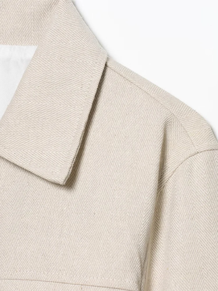 Jaket jahitan lengan panjang bergaya Eropa dengan kerah lapel, cocok untuk segala suasana, dan celana panjang jahitan lurus untuk wanita.