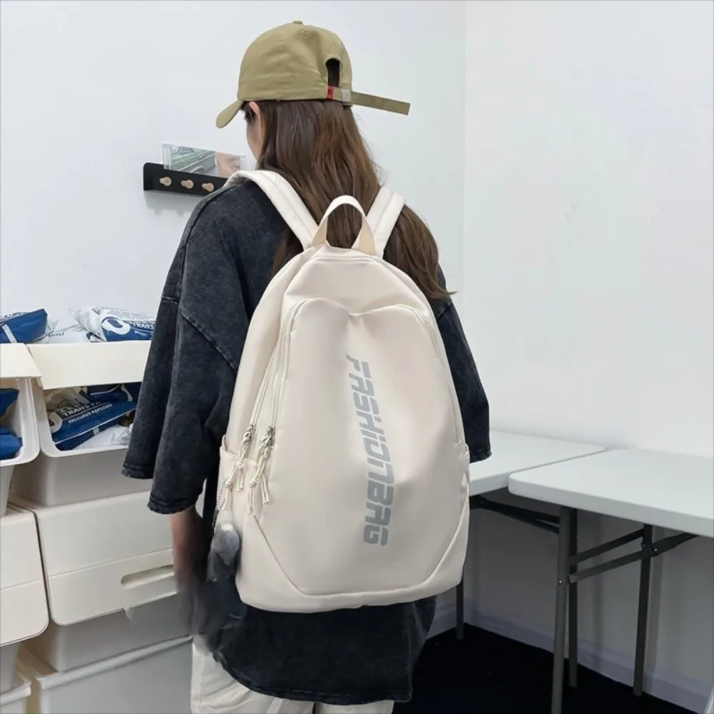 Nueva mochila escolar de gran capacidad, bolsa universitaria ligera con letras, bolsa de libros impermeable