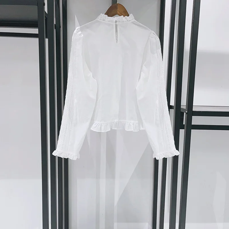 Damska nowa koszula z koronkowymi wstawkami na wiosnę i lato 2026, elegancka bluzka biurowa z długim rękawem i ażurowymi detalami.