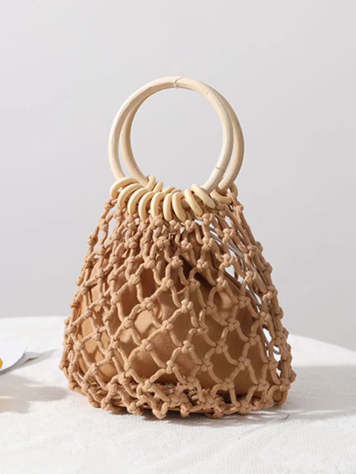 

Circular Wooden Handle Woven Handbag Master Design Fashionable Luxury Hollow Handmade Bucket Handbag Summer Beach Vacation Bag