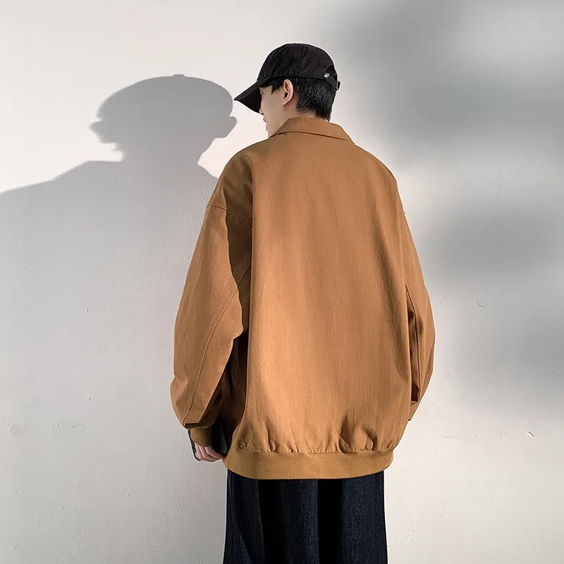 Trendyoversizedcasual Jacket Ina Hong Kong-inspired Retro Styleloose-fitting Yet Flatteringperfect Forcreating Astreet-stylelook