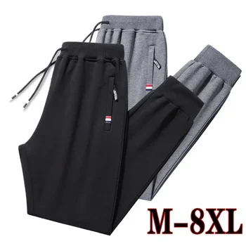 2024 الرجال Sweatpants حجم كبير ملابس رياضية كبيرة مرونة الخصر عادية القطن السراويل الترنك تمتد بنطلون ذكر أسود ركض 8XL