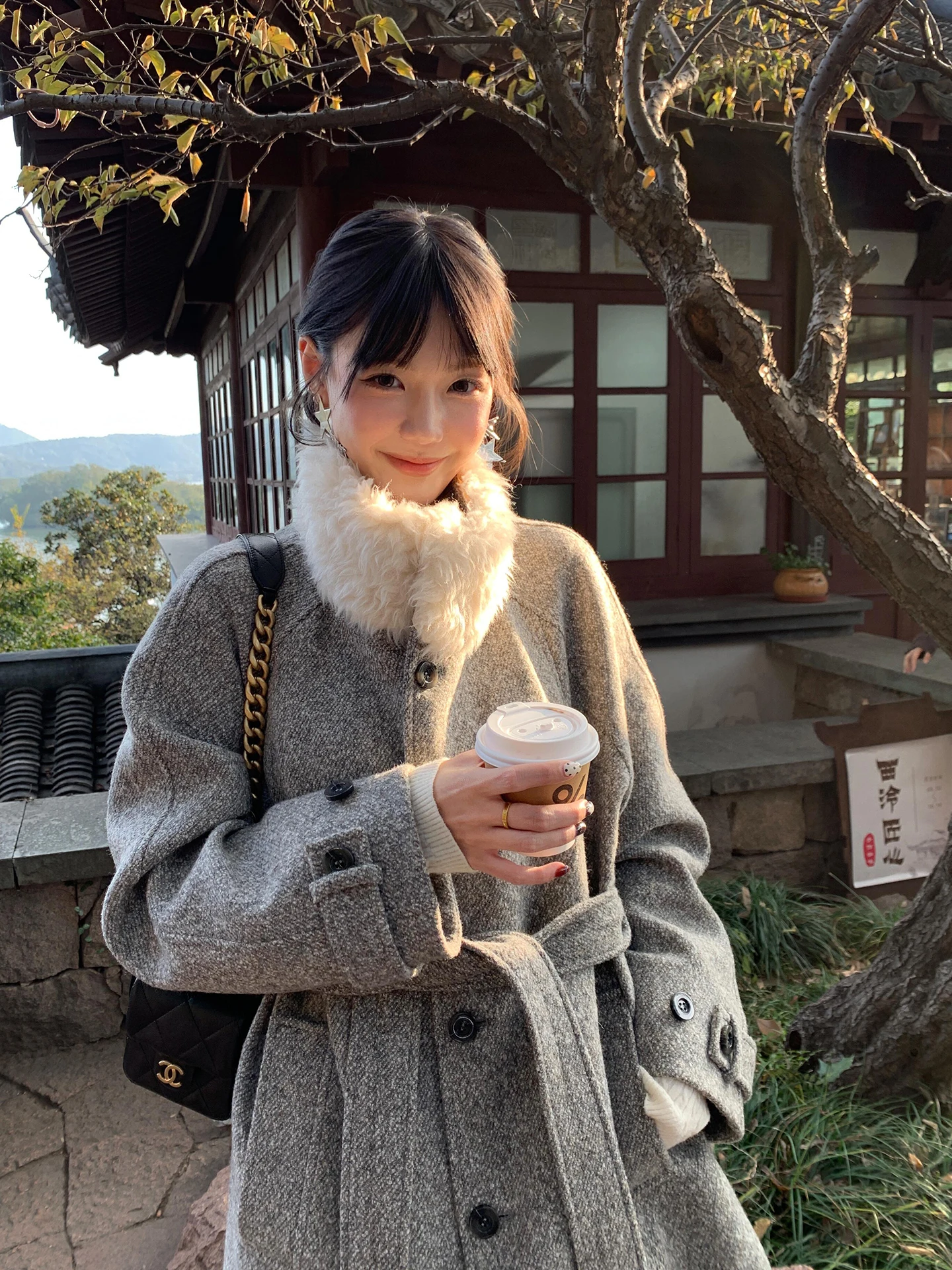 

ay Fur Collar Splicing Design Woolen Coat Women's Winter New Korean Sle High-End Feeling Medium Length Belted Woolen Coat