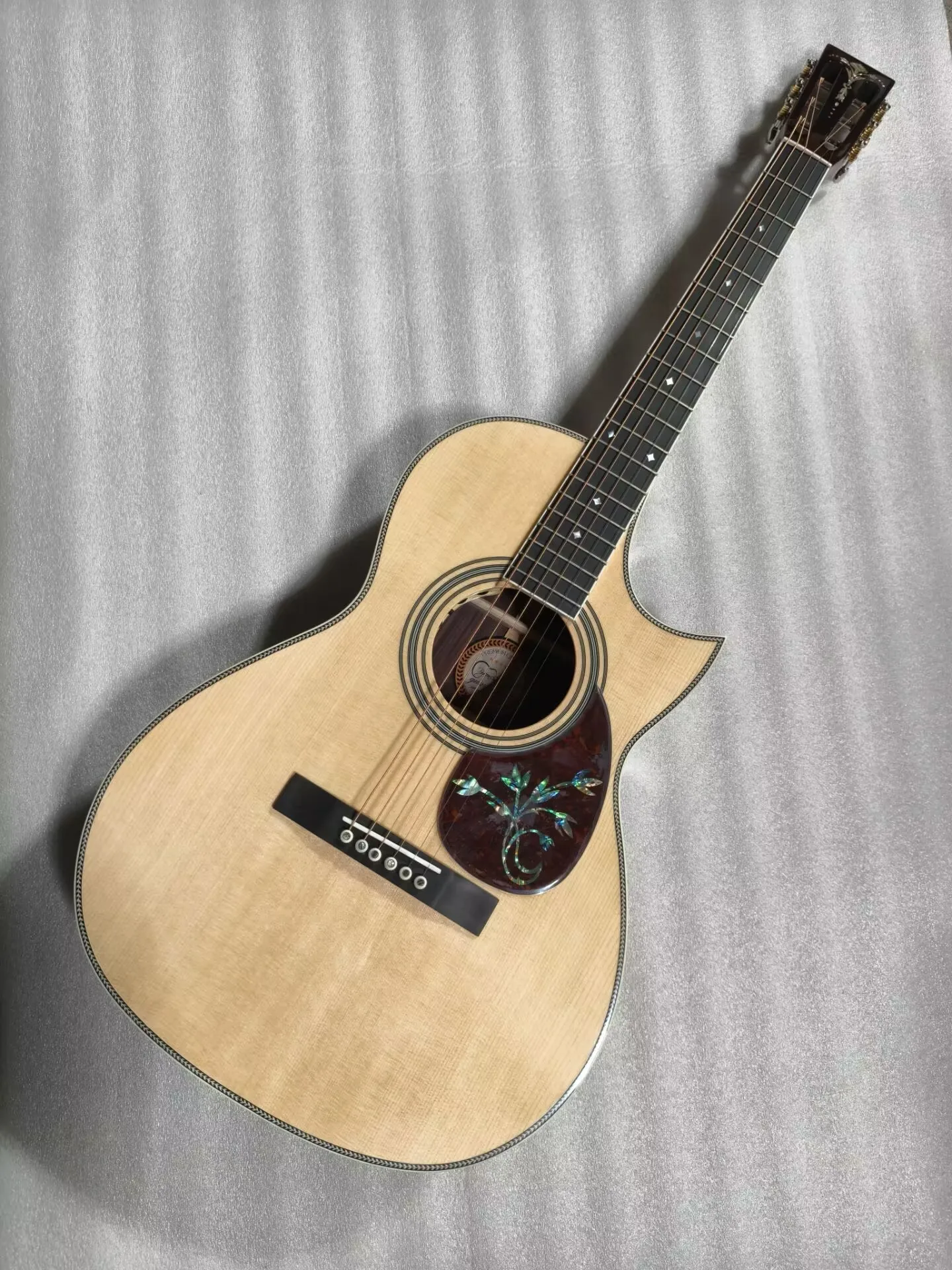 

all solid natural wood color parlor guitar 12 frets The Florence cutaway parlor guitar slotted head only available in USA