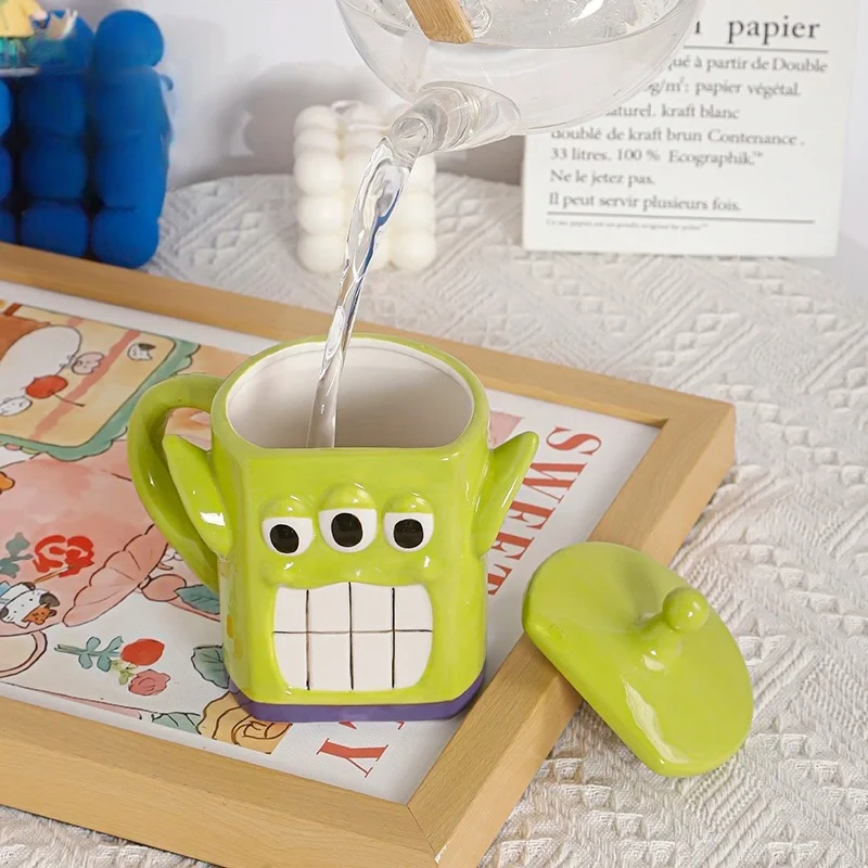

Disney three-eyed monster ceramic mug household cartoon ceramic with lid creative cute large-capacity mugs
