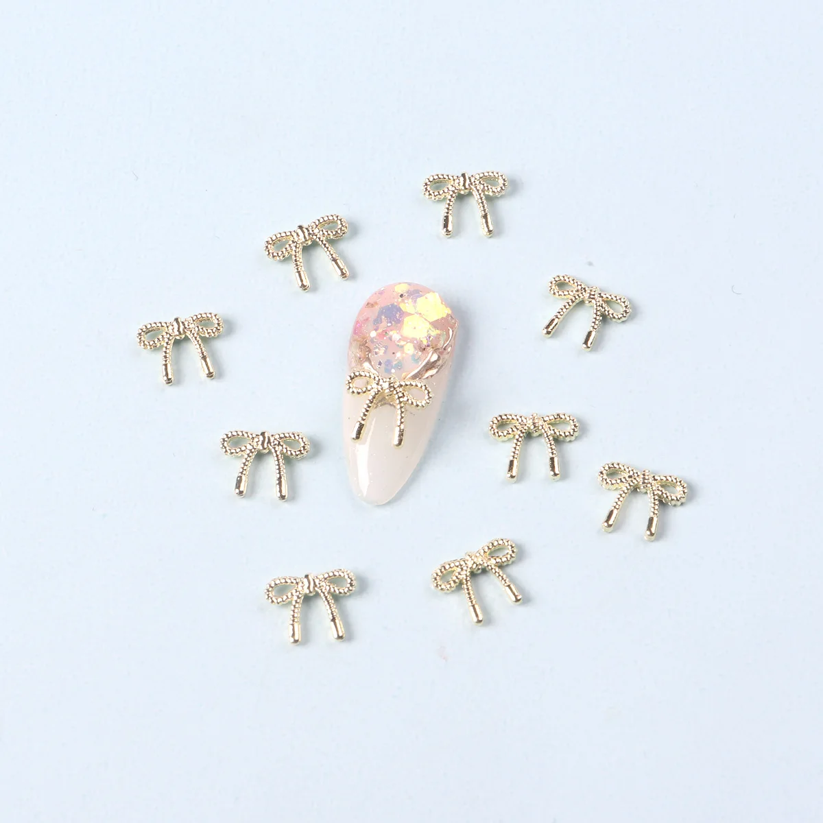 10 ピース/ロットゴールドシルバー弓ネイルチャーム合金韓国ちょう結びリボン金属アクセサリーネイルアートの装飾 DIY デザイン