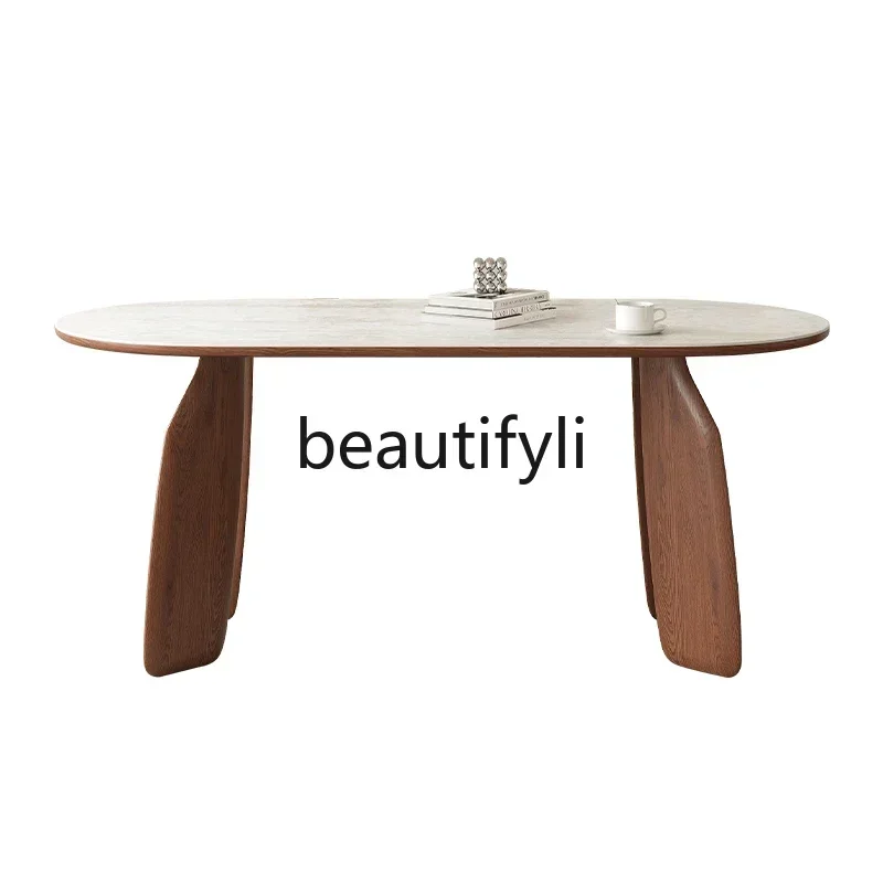 

French travertine rock slab dining table household modern simple solid wood oval dining table