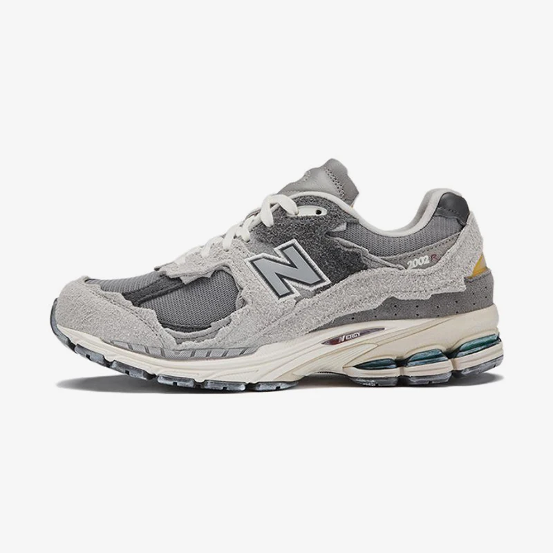 New Balance NB Genuine 2002R Series Zapatos deportivos informales transpirables de malla para hombres y mujeres M2002RDA
