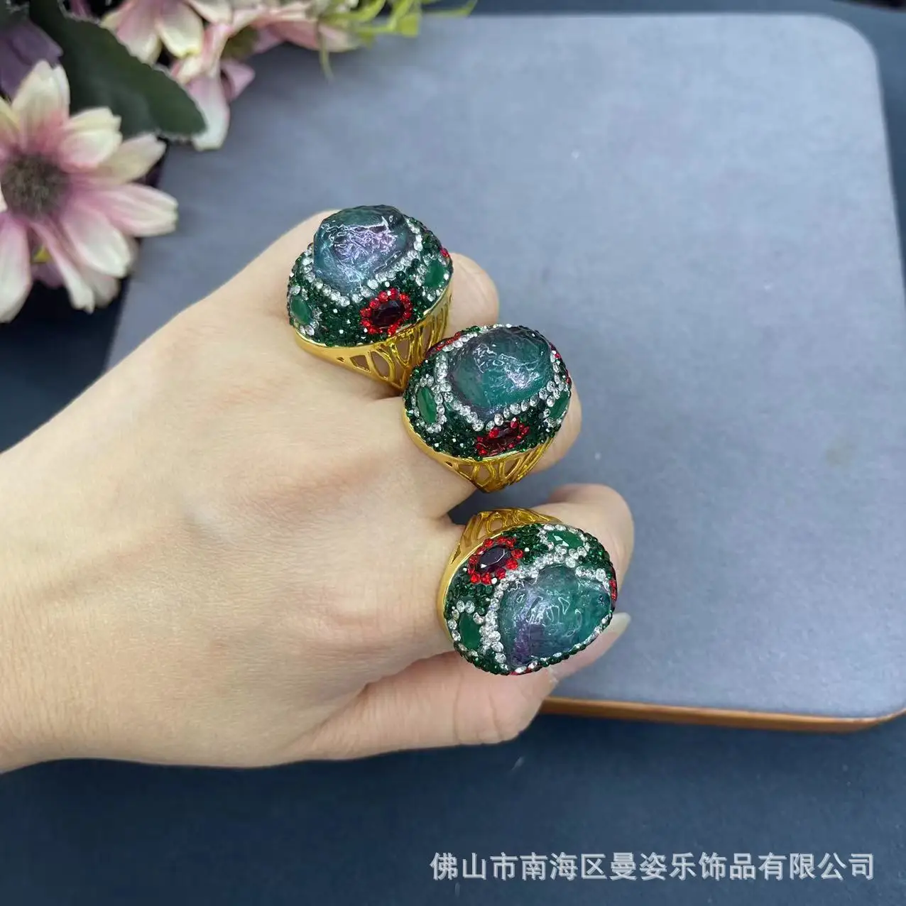 

New colored silver stone inlaid with ruby green live, personalized fashion, wholesale ring from American jewelry manufacturers