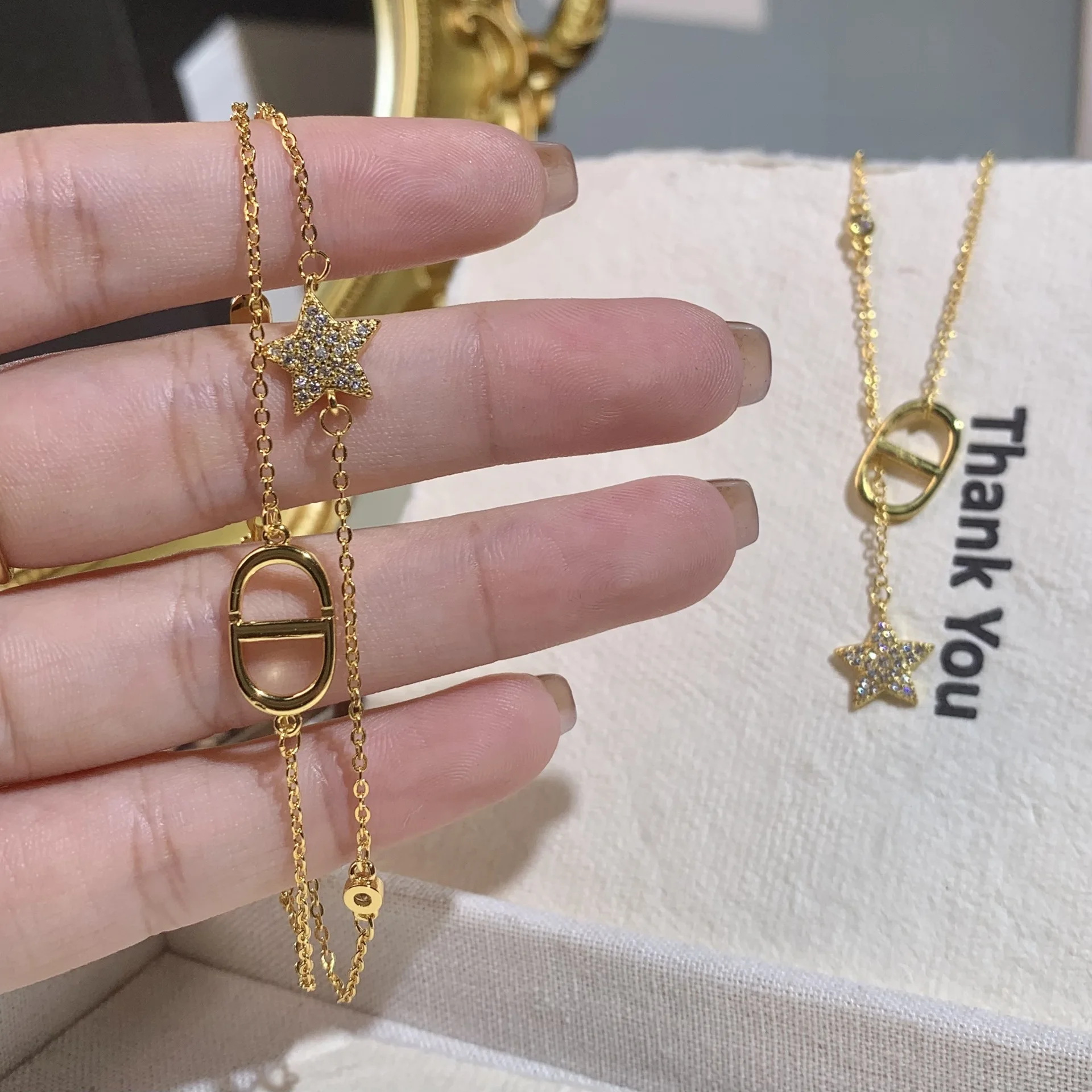 سوار بطبقة مزدوجة على شكل نجمة أولي من CD لعام 2026 للنساء، سلسلة حروف الزركون الرائعة مع شرابة، فكرة هدية عصرية #3