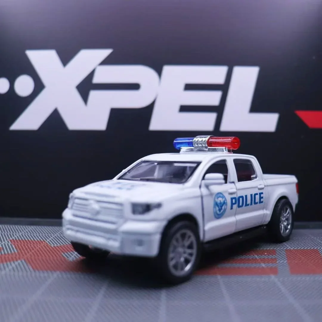 1: 32 Toyota Tundra Ford Raptor Captador Modelo de carro de polícia Modelo de carro de liga Som e luz Potência Brinquedo infantil Presente de aniversário