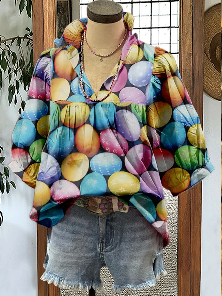 Blusa de manga bufante com estampa de ovo de Páscoa de coelho fofo