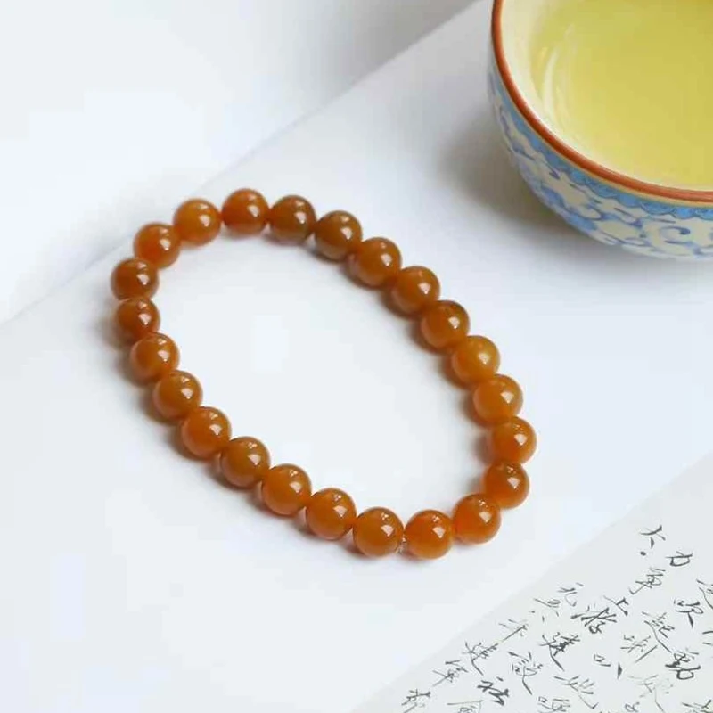 

Bracelet: Natural Hotan Jade, Qiemou , Old Material, Full Sugar Color, Round and Smooth Beads