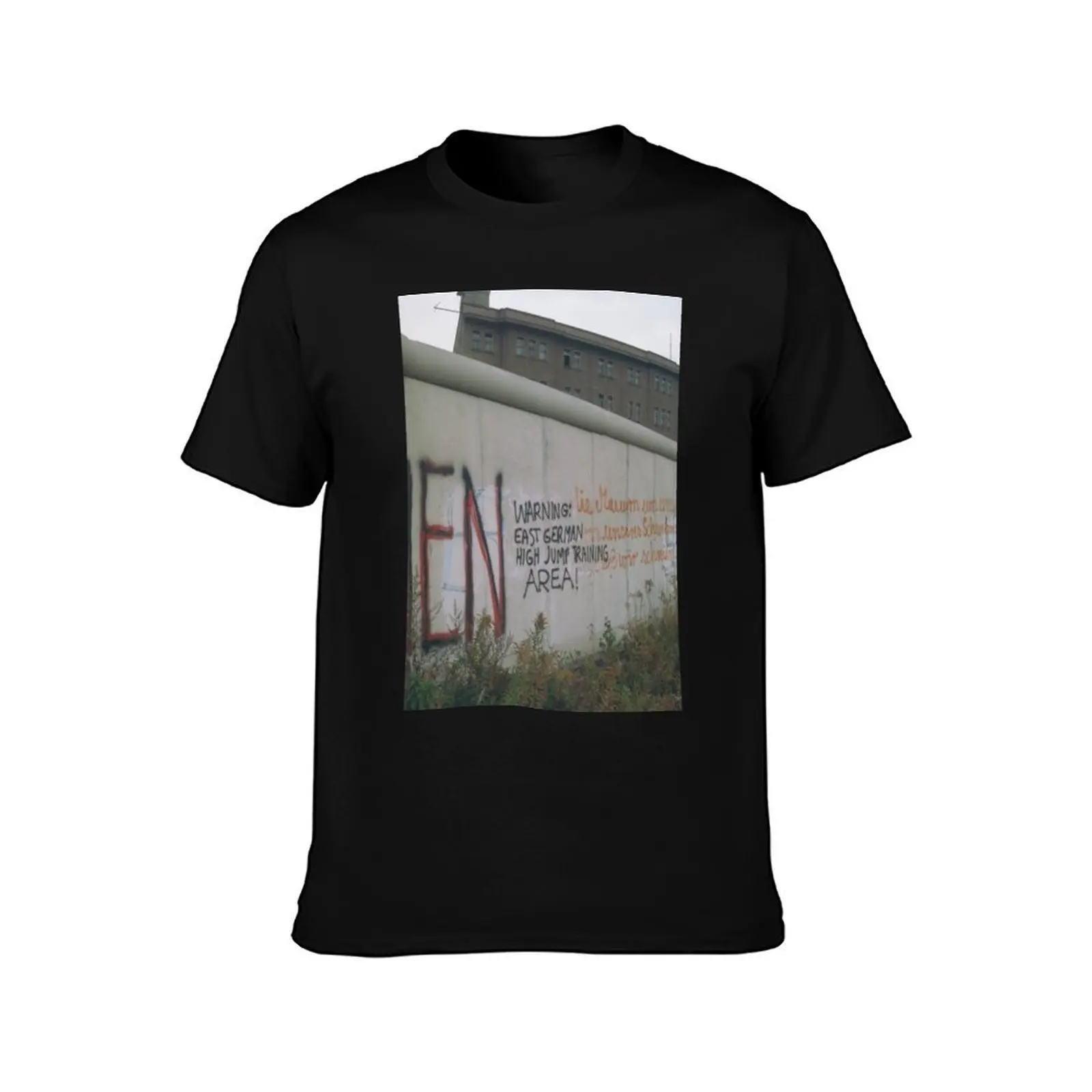 Amusing/funny Berlin Wall graffiti - East German High Jump training area T-Shirt Work Casual Loose Fit T-Shirt