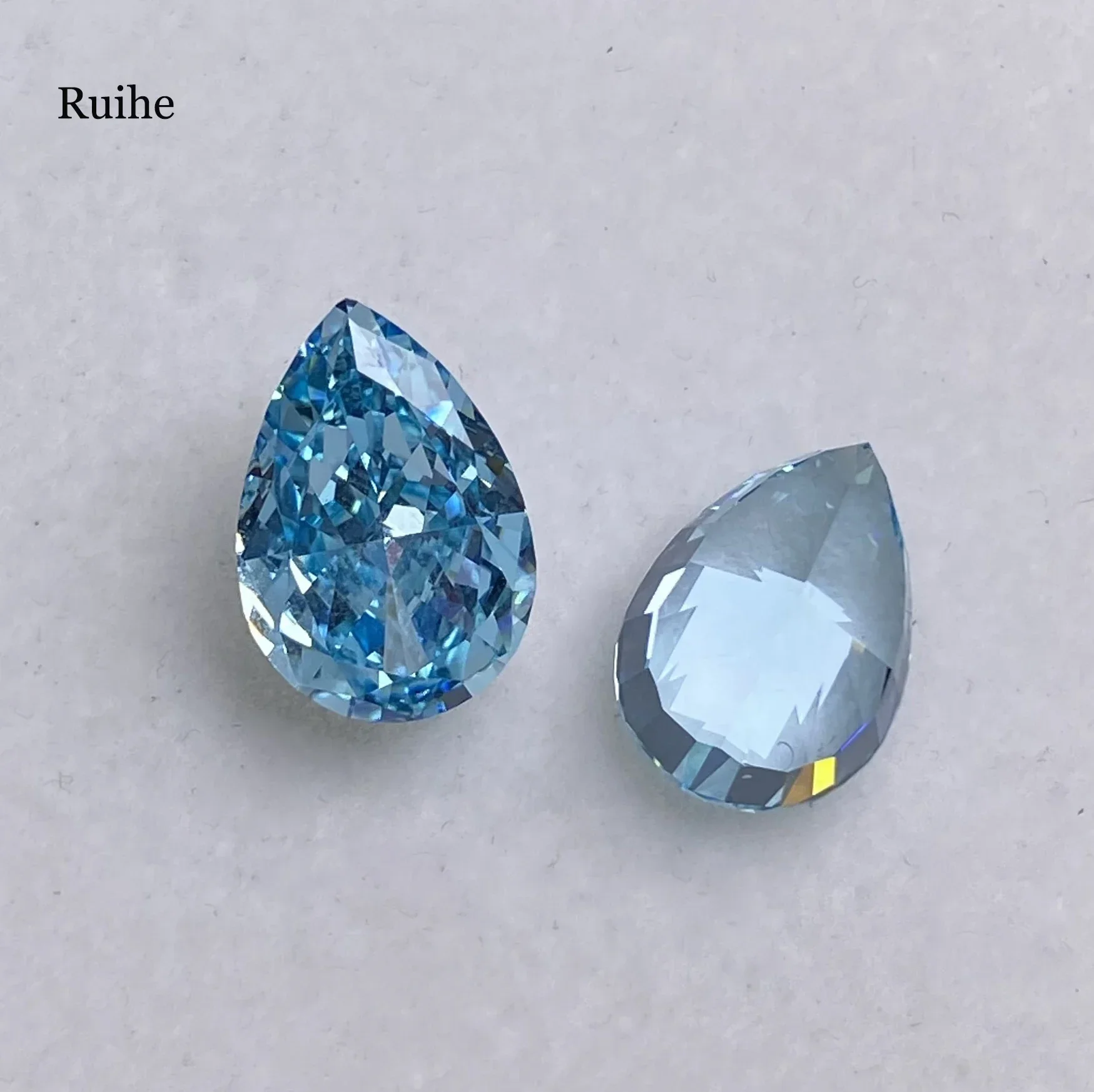 Ruihe High Quality Aquamarine Blue Color Pear Drop Shape 5A Carbon Zirconia Handmade Stone  Crushed Ice Cutfor Jewelry Making