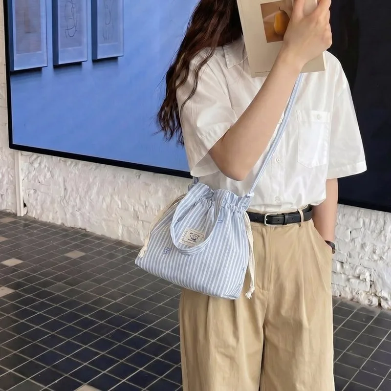 

Light Blue Plaid Drawstring Tote Crossbody Bag, Casual Daily Carryall for Women, Ideal for School, Short Shopping Trips
