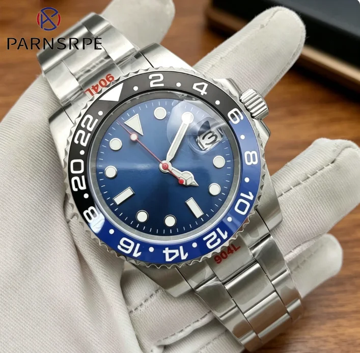 Self-winding men's watch with blue dial, NH35 black and blue coloured ceramic bezel, 100m water resistant sapphire crystal.