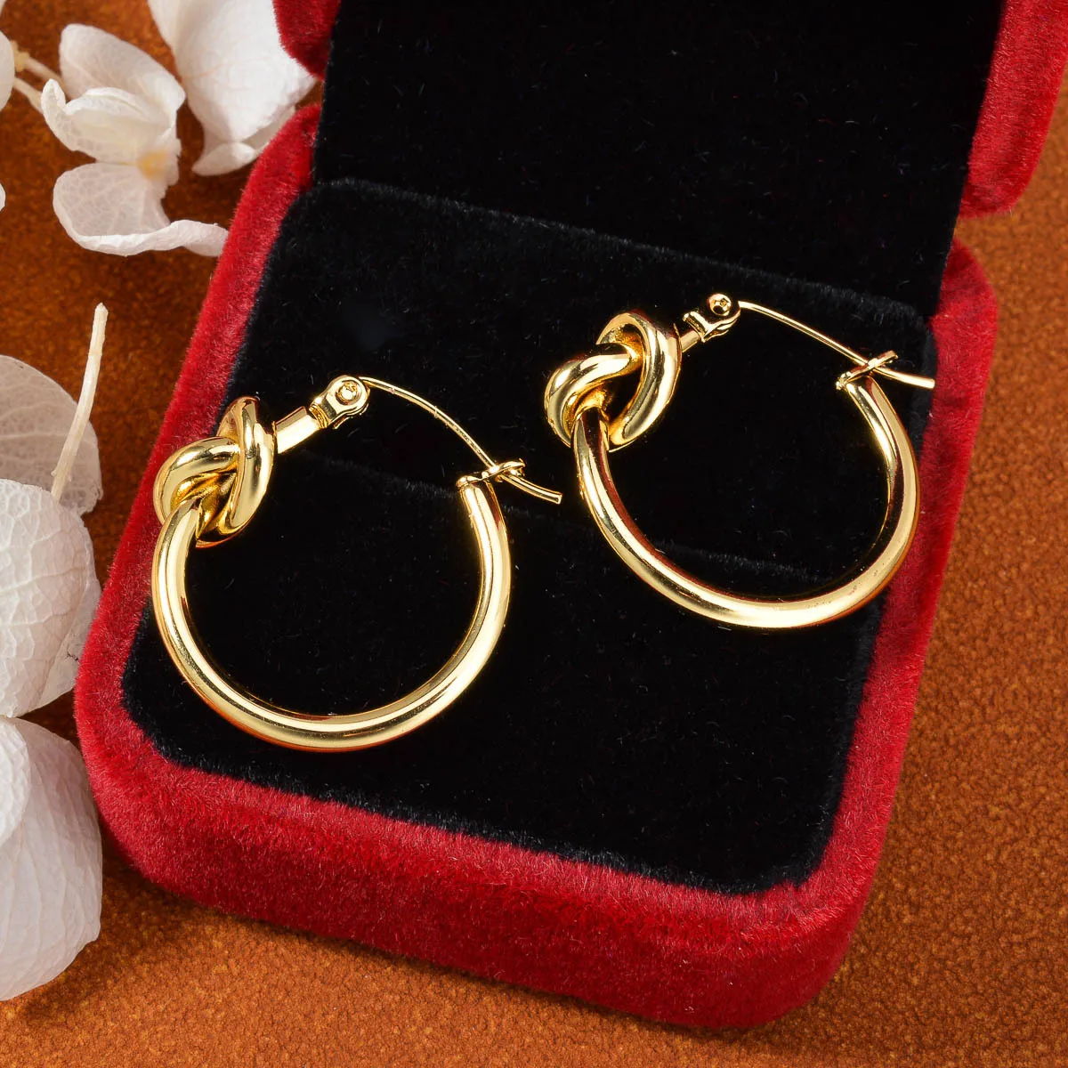 European-style simple knot earrings, circular ear studs for women, stainless steel plated gold jewelry, wholesale available