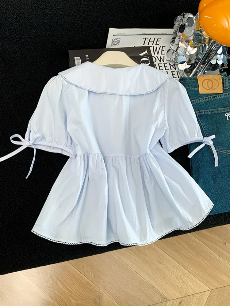 

White Doll Collar Bubble Sleeve Shirt Women's Summer New Unique Fashion Wooden Ear Ring Tied Short Sleeve Blouse Top