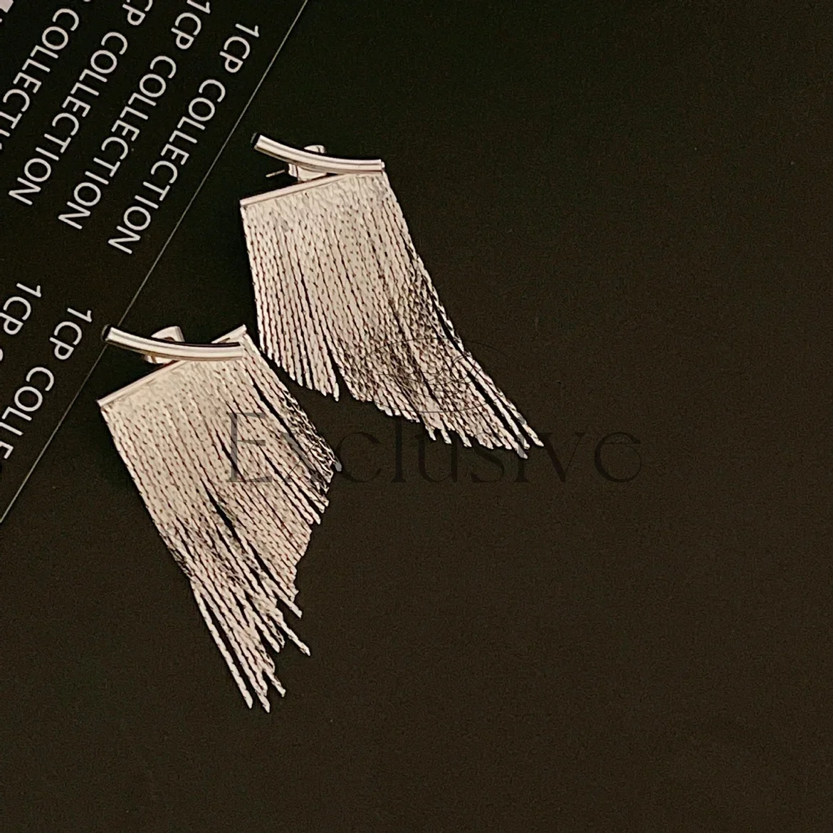European dollar fringed women's silver needle earrings niche design light luxury high-end earrings